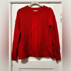 Red cable knit sweater